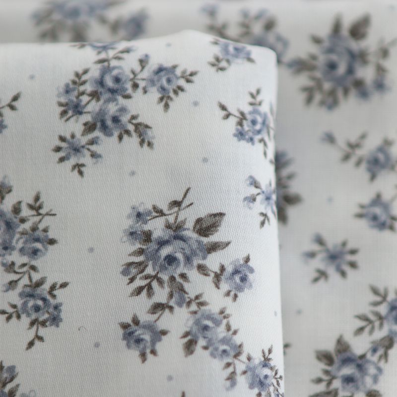 Lilou - Batiste de coton douce à imprimé exclusif fleuri vert et bleu