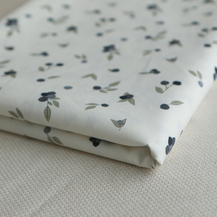 Hind - Popeline douce coton BIO organique fond blanc imprimé exclusif vert et bleu