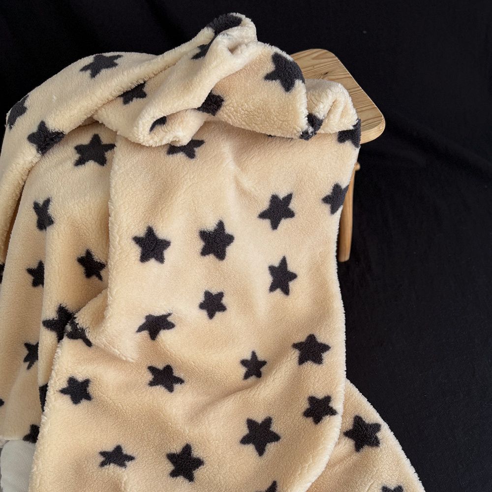 Teddy / moumoute bouclé / sherpa fond crème motif étoiles