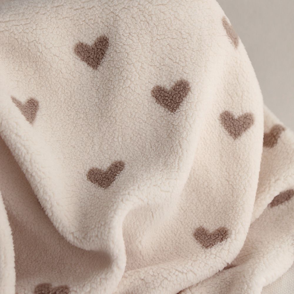 Teddy / moumoute bouclé fond lait motif coeurs