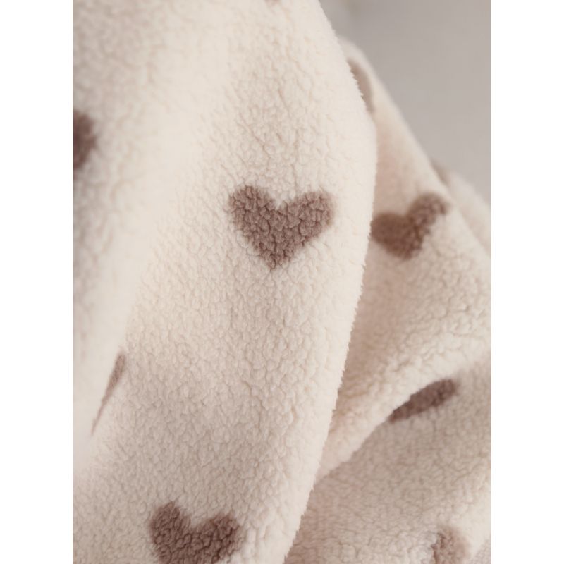 Teddy / moumoute bouclé fond lait motif coeurs