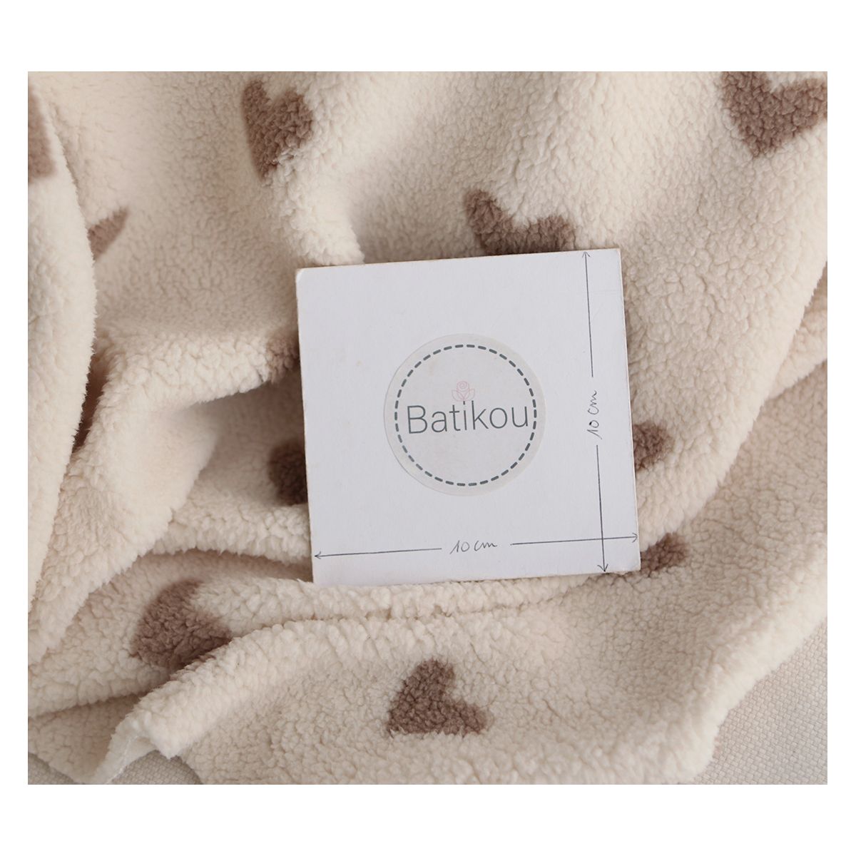 Teddy / moumoute bouclé fond lait motif coeurs Teddy / moumoute bouclé fond lait motif coeurs