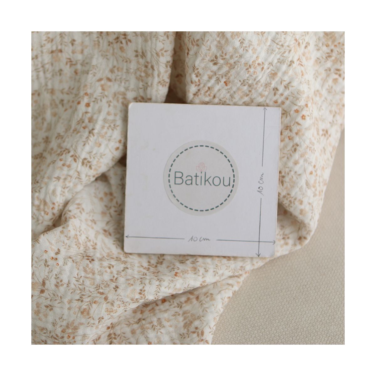 Double gaze de coton imprimés fleuri beige clair