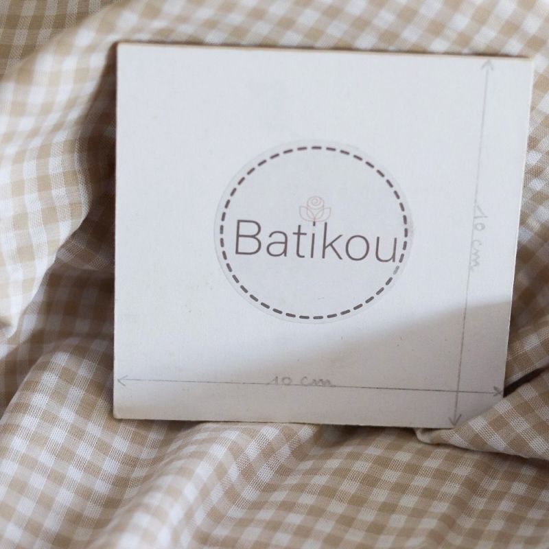 Seersucker / Coton gaufré vichy blanc et sable