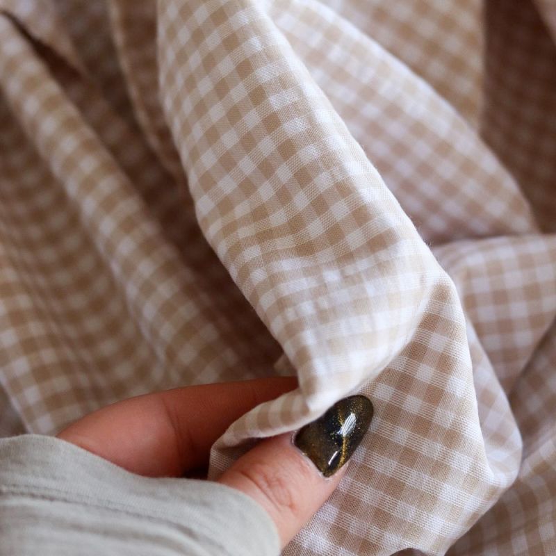 Seersucker / Coton gaufré vichy blanc et sable