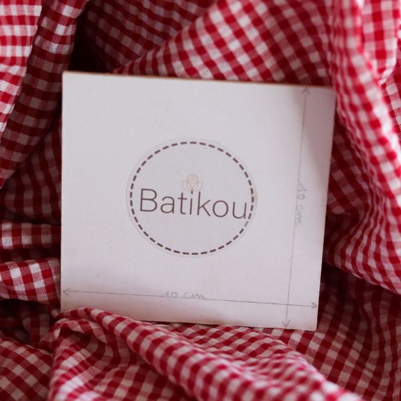 Seersucker / Coton mélangé gaufré vichy blanc et rouge