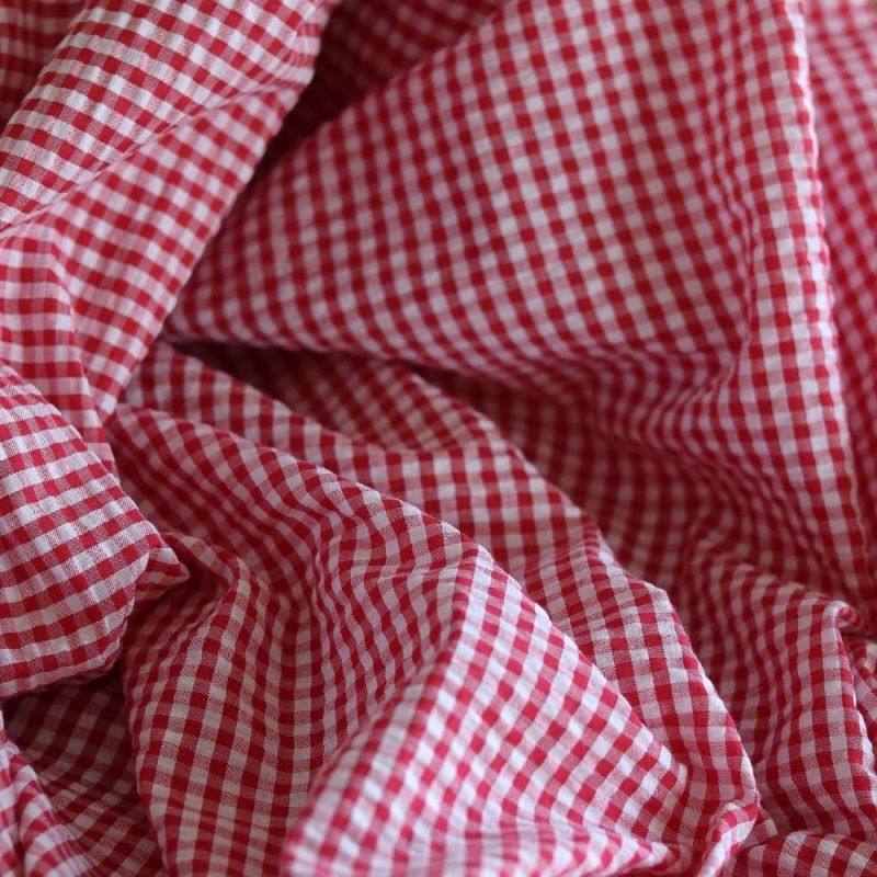 Seersucker / Coton mélangé gaufré vichy blanc et rouge