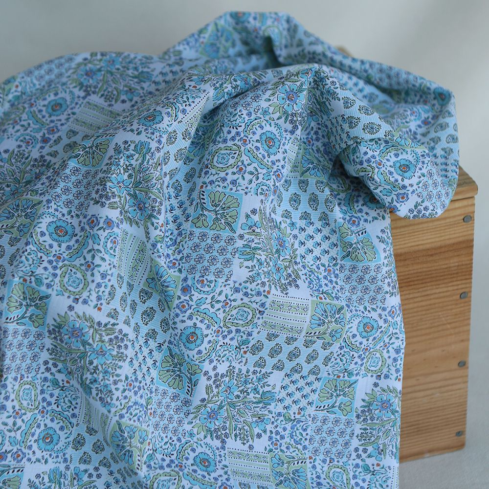 Isabelle - Batiste de coton à imprimé patchwork bleu