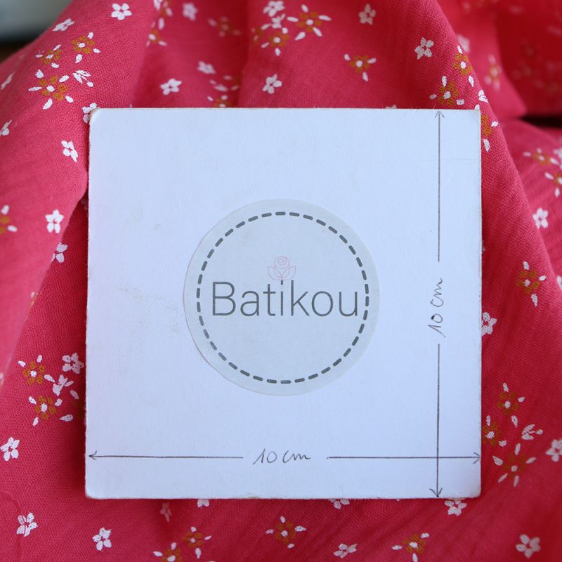 Lena - Double gaze de coton motif fleuri fond framboise