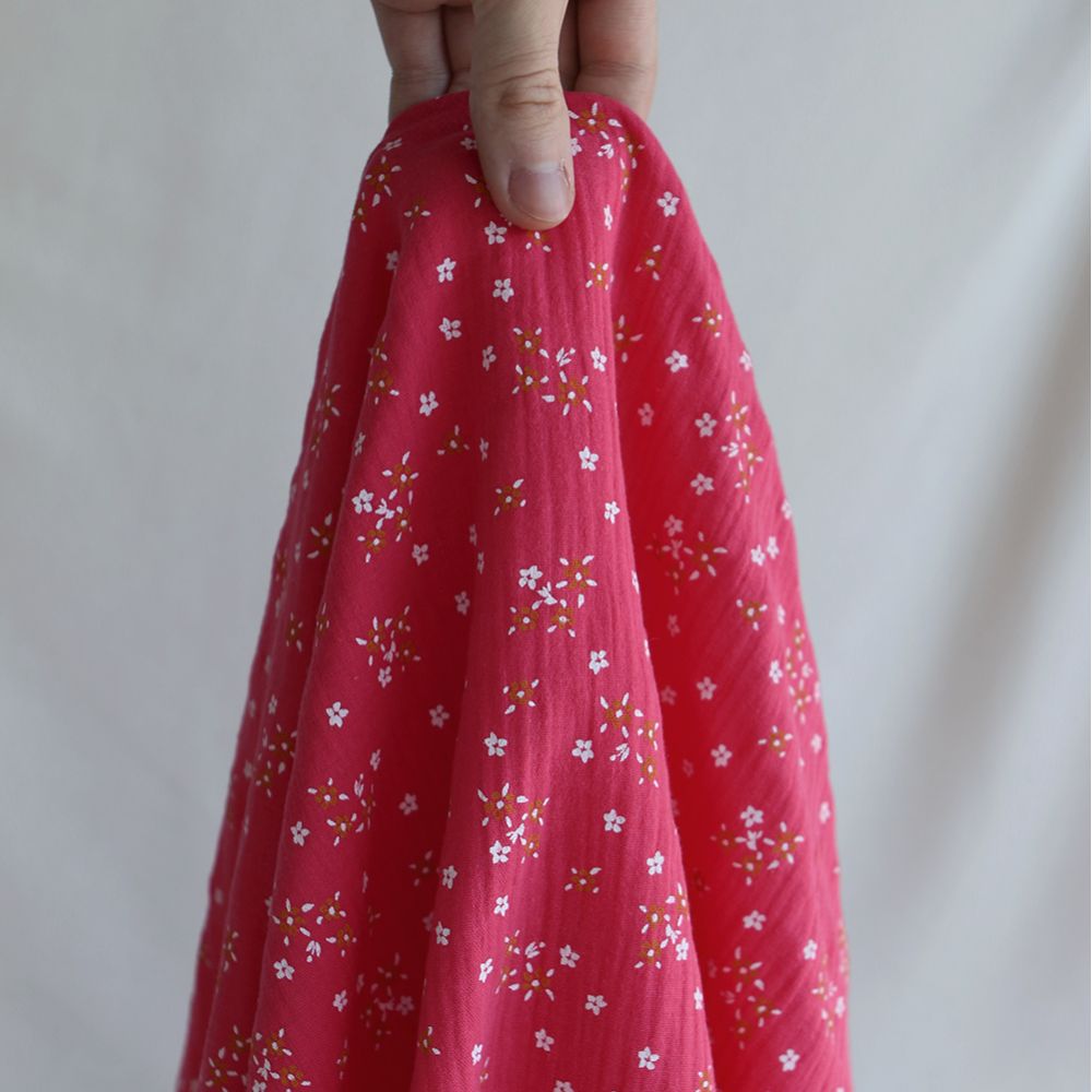 Lena - Double gaze de coton motif fleuri fond framboise