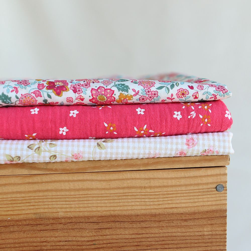 Lena - Double gaze de coton motif fleuri fond framboise