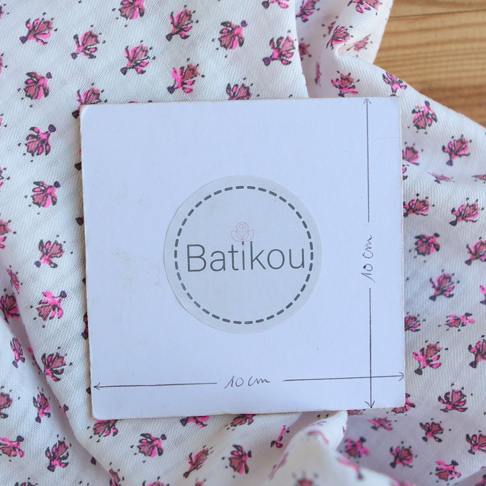 Seersucker / Coton gaufré doux fond blanc cassé petite indienne rose fluo