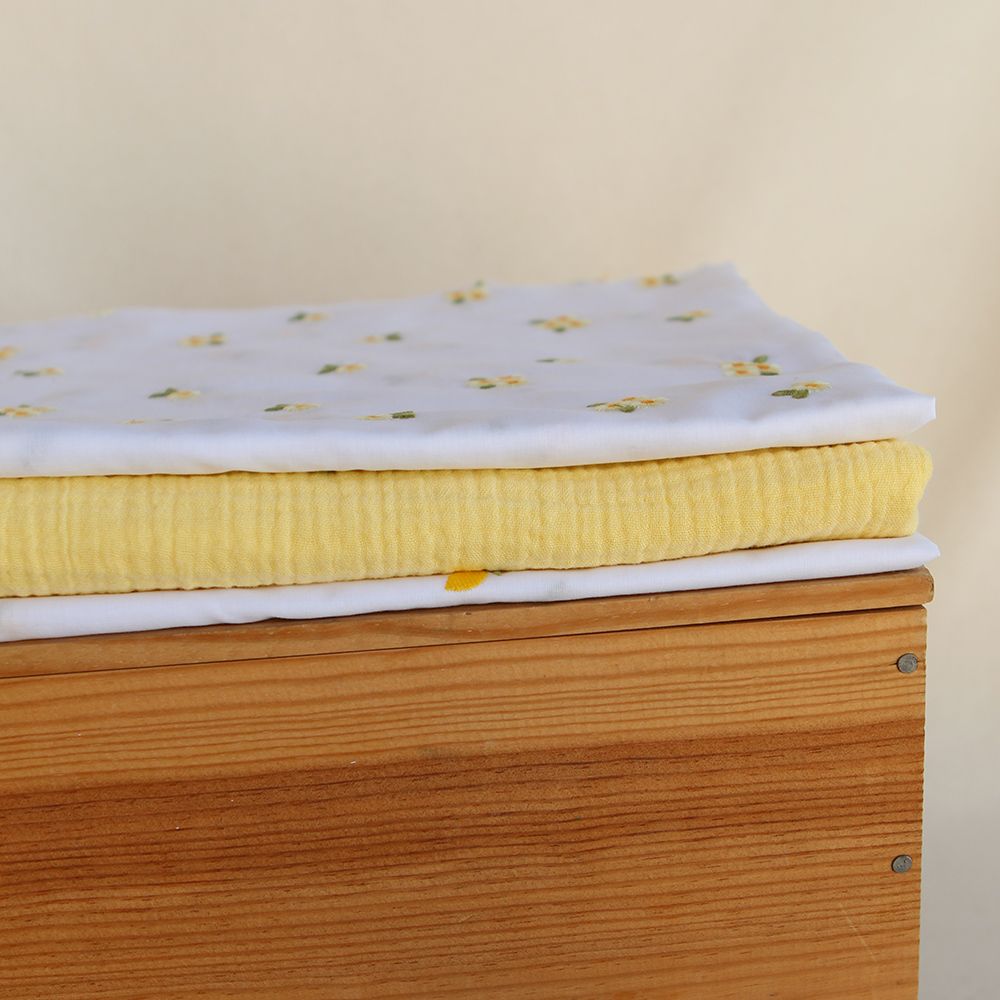 Floralie - Voile de coton blanc broderies petites fleurs jaunes