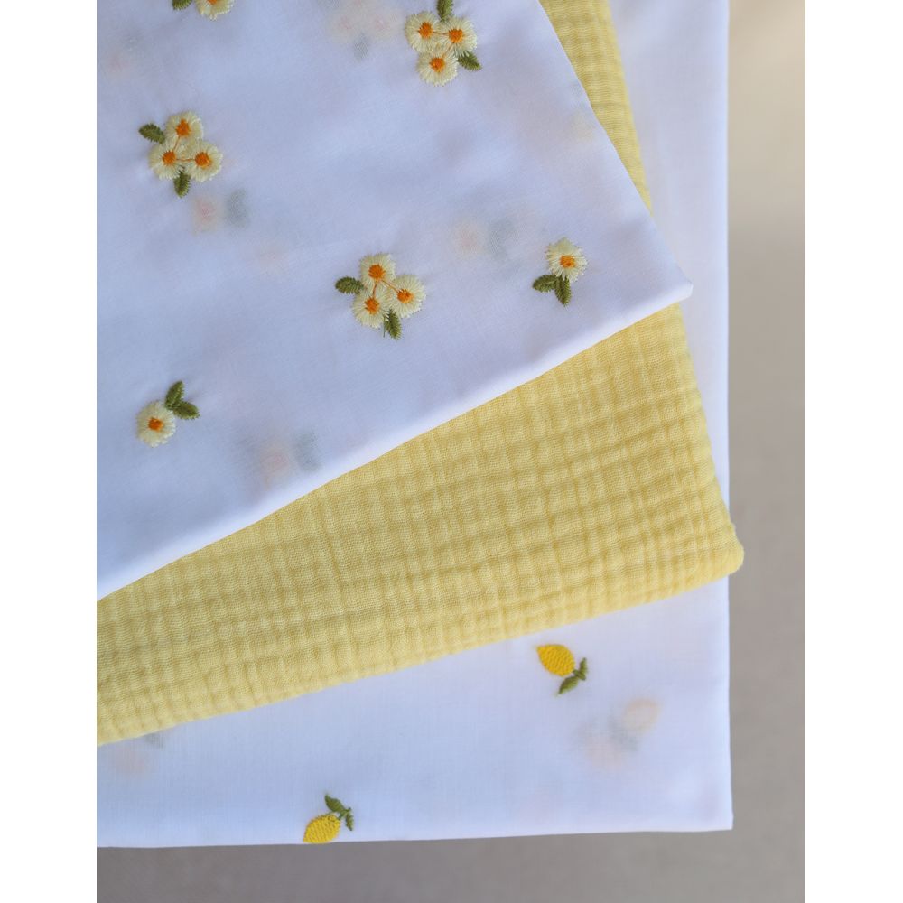 Floralie - Voile de coton blanc broderies petites fleurs jaunes