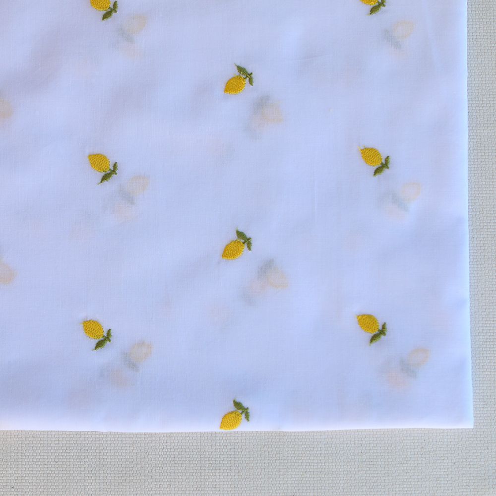Basile - Voile de coton blanc broderies petits citrons