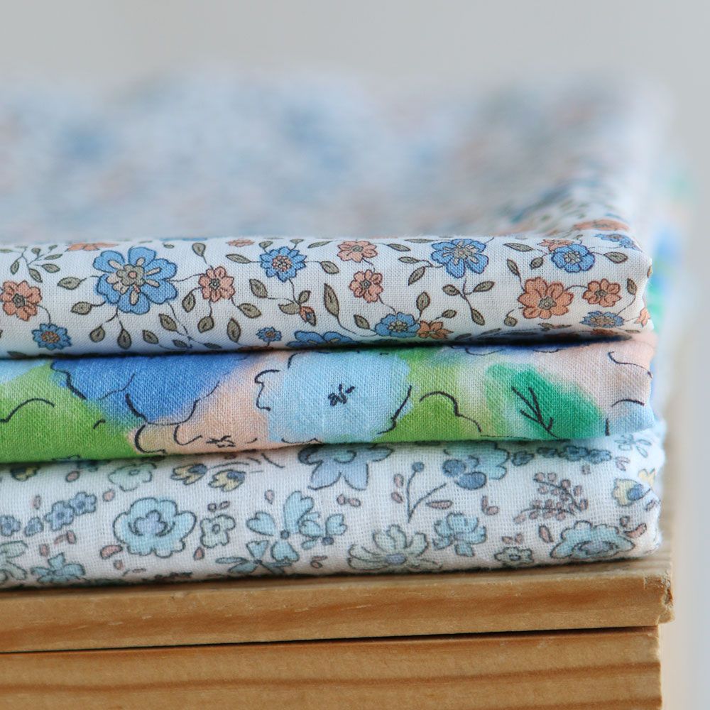 Albane - Double gaze de coton motif fleuri bleu ciel