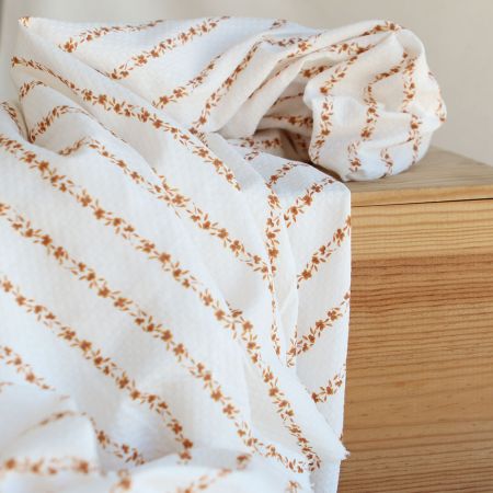 Alicia - Tissu coton texturé imprimé ambre Alicia - Tissu coton texturé imprimé ambre