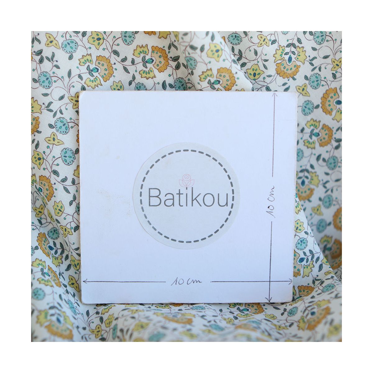 Valentine - Batiste de coton SILKYNE à imprimé fleuri orange et bleu Valentine - Batiste de coton SILKYNE à imprimé fleuri orange et bleu