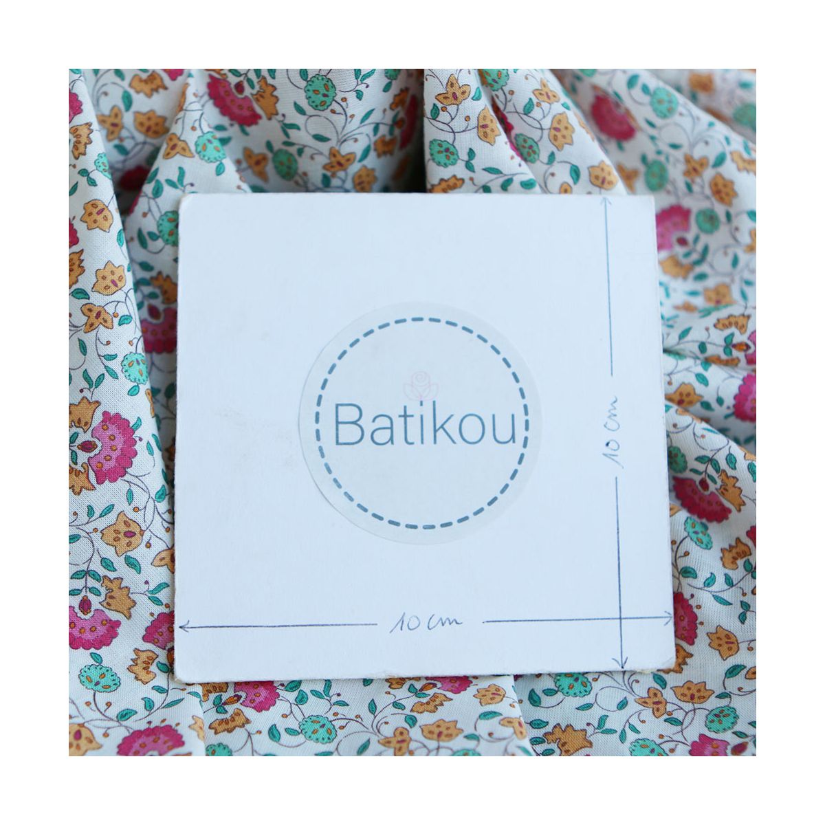 Valentine - Batiste de coton SILKYNE à imprimé fleuri rose orange Valentine - Batiste de coton SILKYNE à imprimé fleuri rose orange