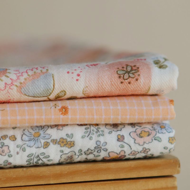 Albane - Double gaze de coton motif fleuri bleu ocre