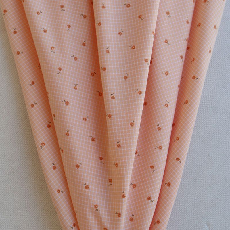 Seersucker quadrillage fin minis fleurs fond sorbet abricot