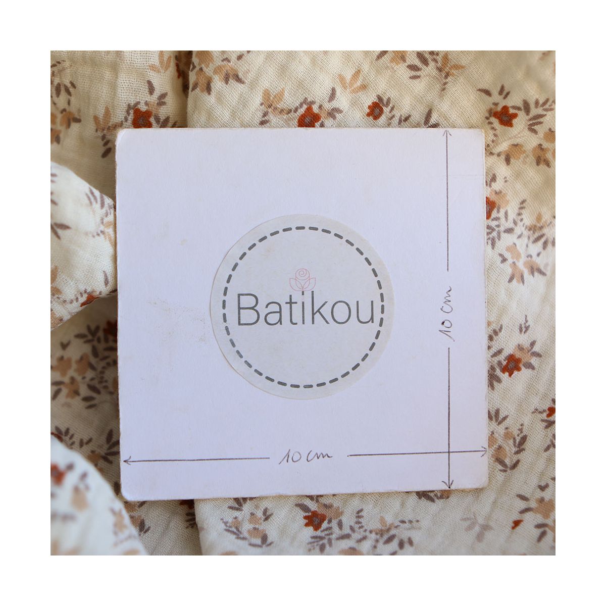 Namra - Double gaze de coton fond écru motif fleuri