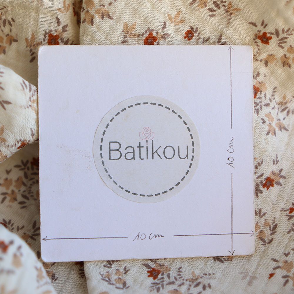 Namra - Double gaze de coton fond écru motif fleuri