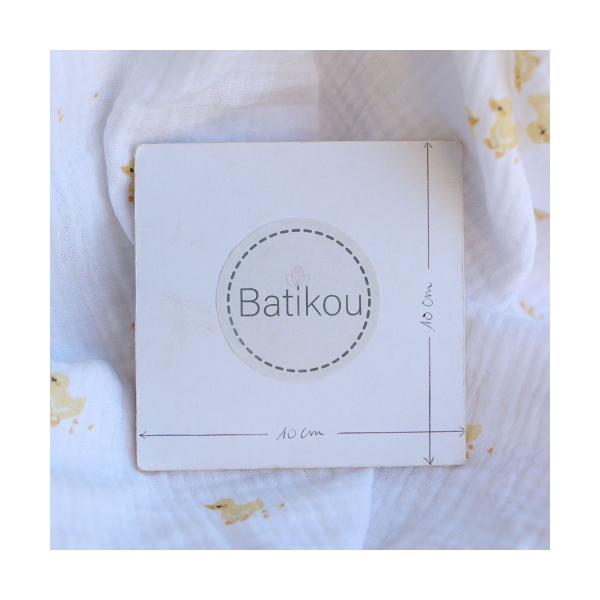 Cannetons - Double gaze de coton fond blanc motif cannetons jaunes