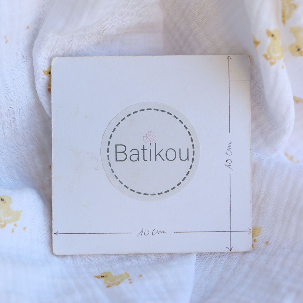 Cannetons - Double gaze de coton fond blanc motif cannetons jaunes