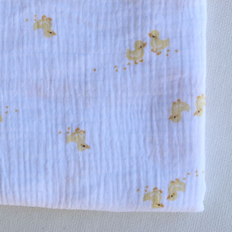 Cannetons - Double gaze de coton fond blanc motif cannetons jaunes