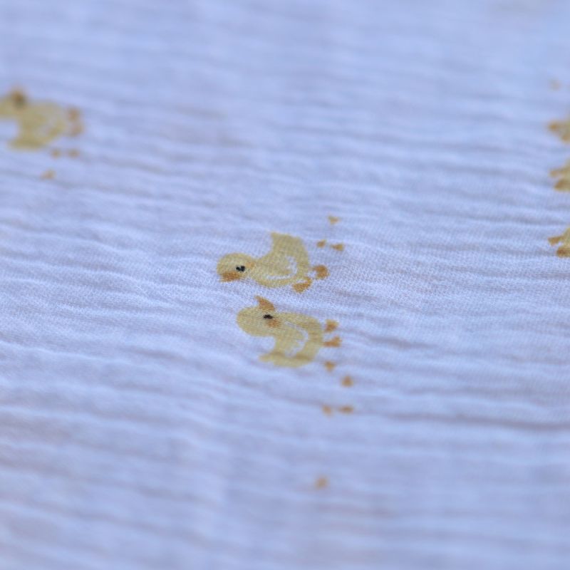 Cannetons - Double gaze de coton fond blanc motif cannetons jaunes