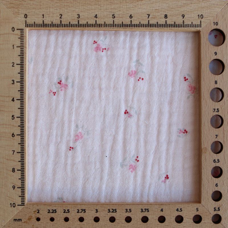 Leonie - Double gaze de coton motif fond rose tendre motif petit fleuri