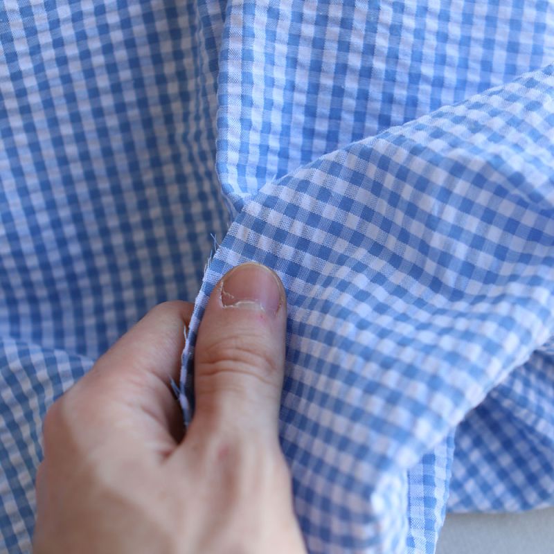 Seersucker / Coton mélangé gaufré vichy blanc et bleu ciel