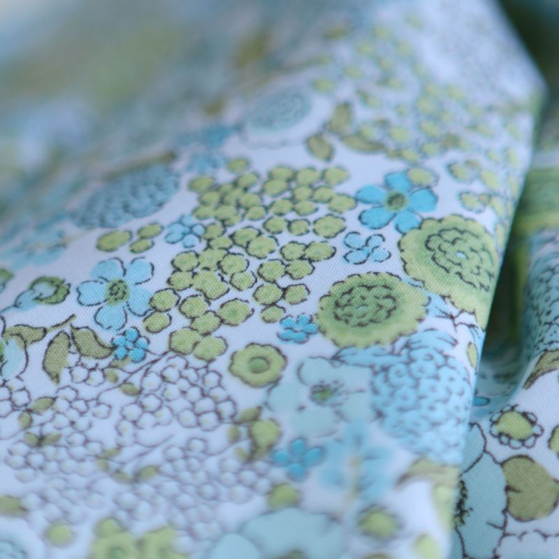 Charline - Popeline de coton BIO imprimé fleuri bleu