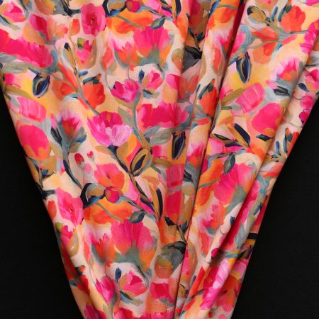 Fabiola - Viscose Ecovero imprimé fleuri orange / fuschia Fabiola - Viscose Ecovero imprimé fleuri orange / fuschia
