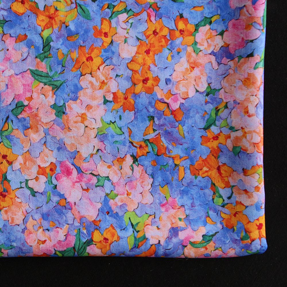 Cécile - Viscose satinée imprimé fleuri parme