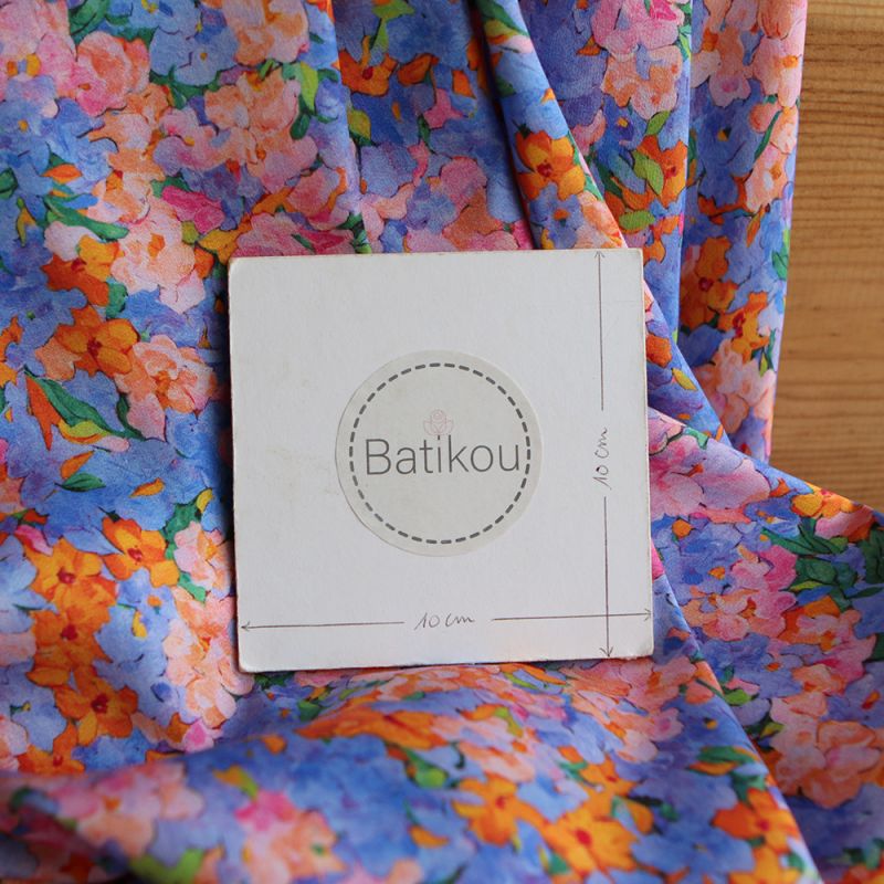 Cécile - Viscose satinée imprimé fleuri parme