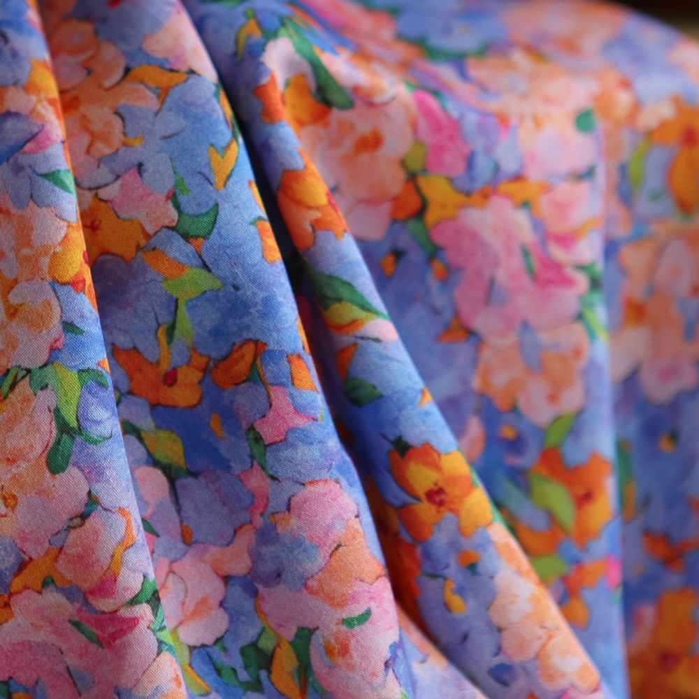 Cécile - Viscose satinée imprimé fleuri parme