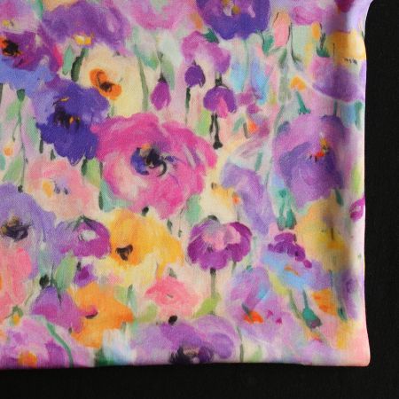 Emna - Viscose satinée imprimé fleuri parme Emna - Viscose satinée imprimé fleuri parme