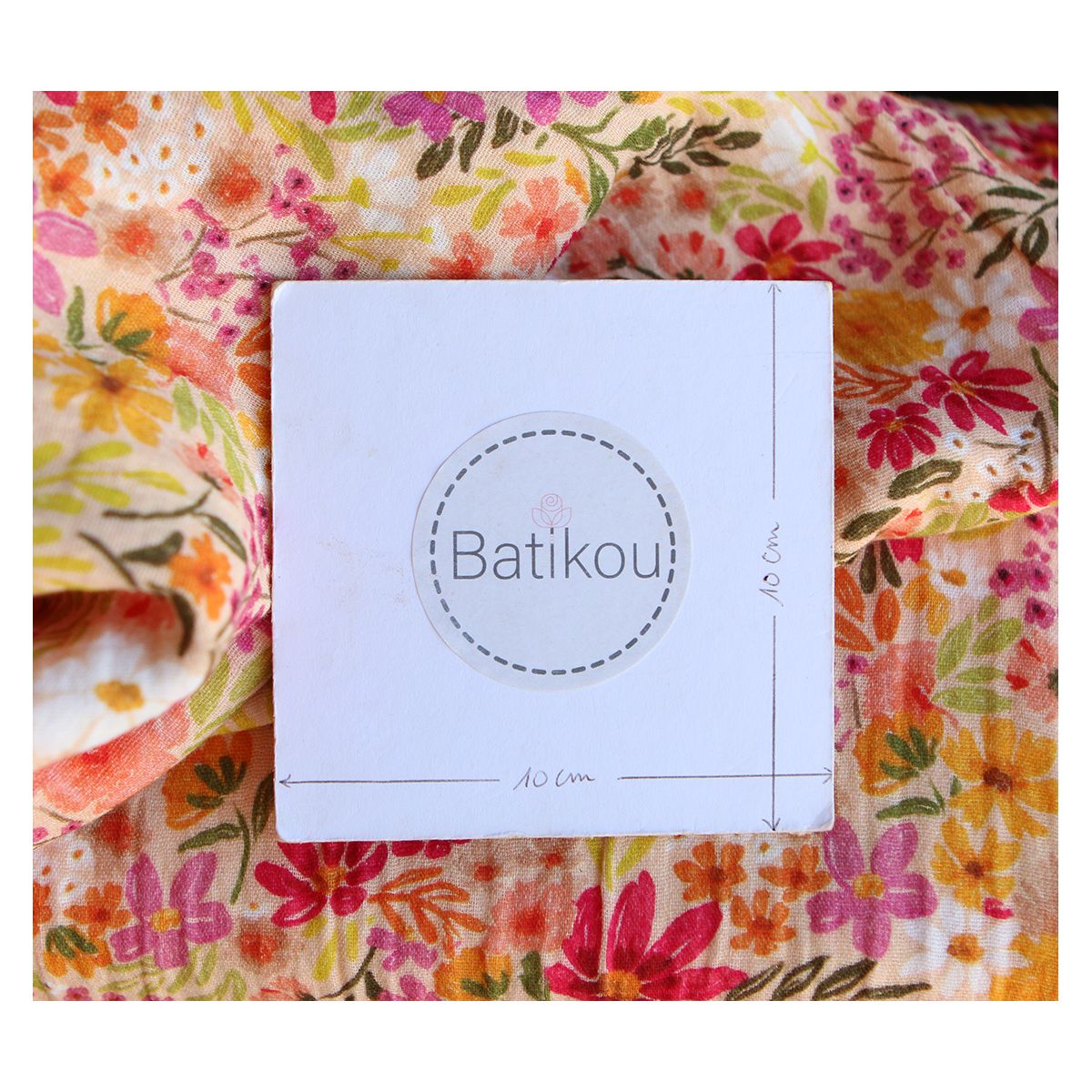 Irina - Double gaze de coton motif fleuri corail fruité