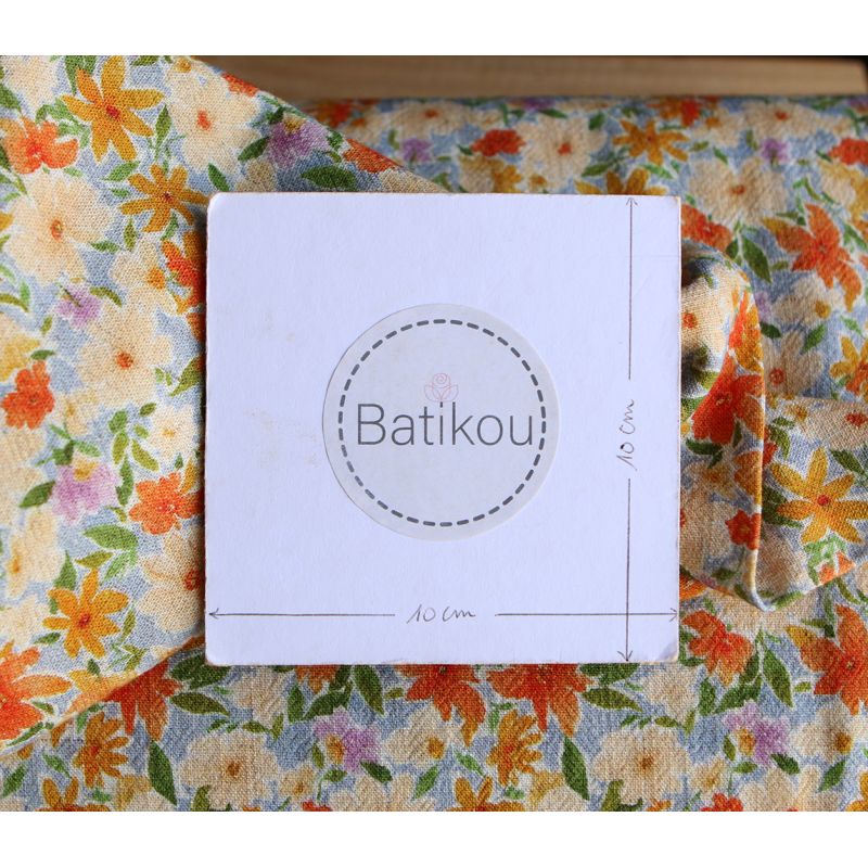 Crêpe lin et viscose imprimé fleuri orangé