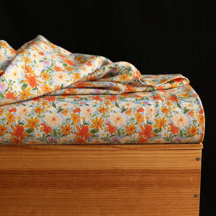 Crêpe lin et viscose imprimé fleuri orangé