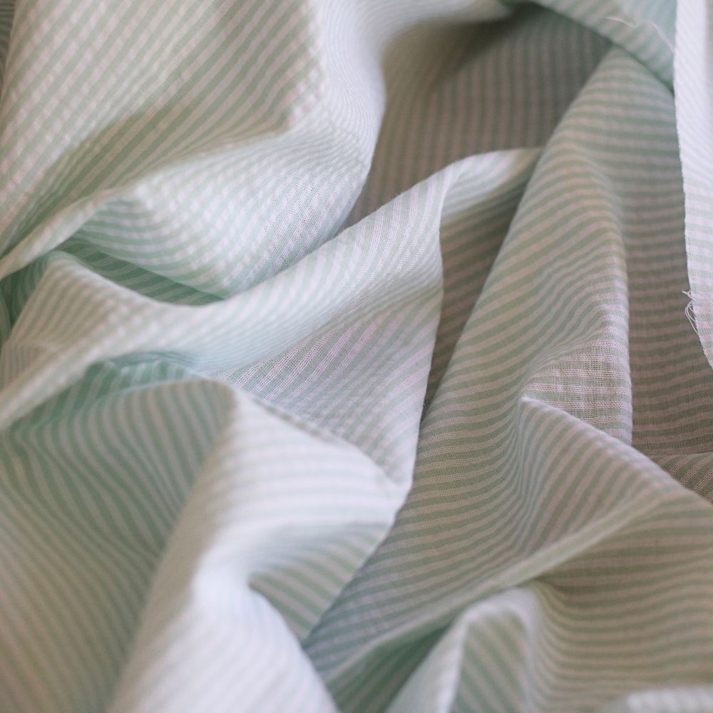 Seersucker / Coton gaufré rayures blanc et vert d'eau