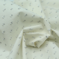 Popeline de coton écru plumetis argent