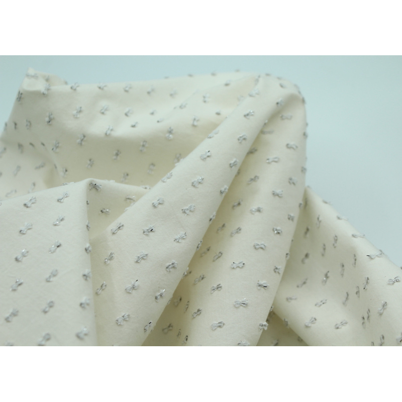 Popeline de coton écru plumetis argent