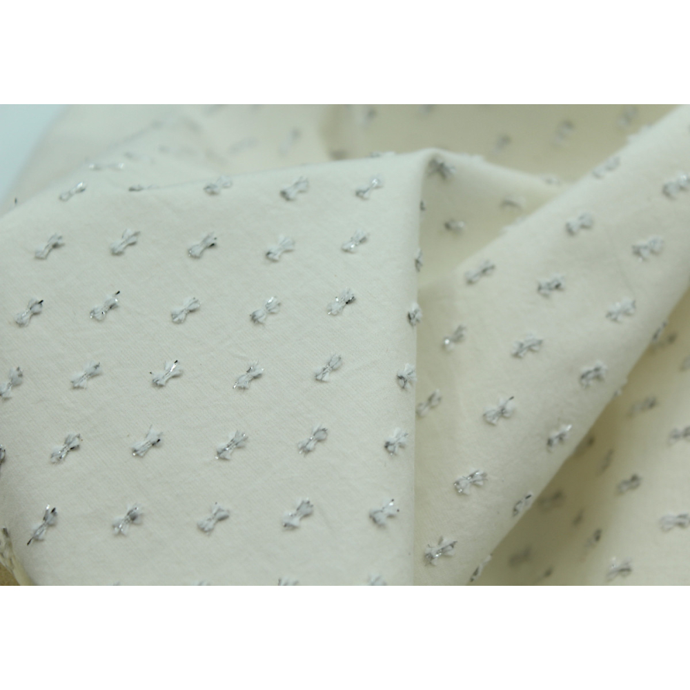 Popeline de coton écru plumetis argent