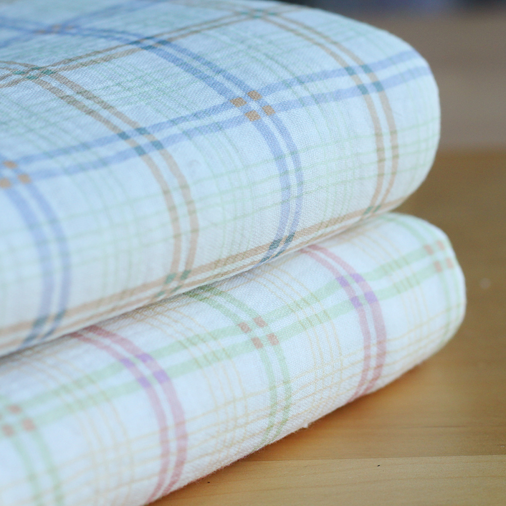 copy of Solea - Double gaze de coton coloris fond jaune pastel motif soleil