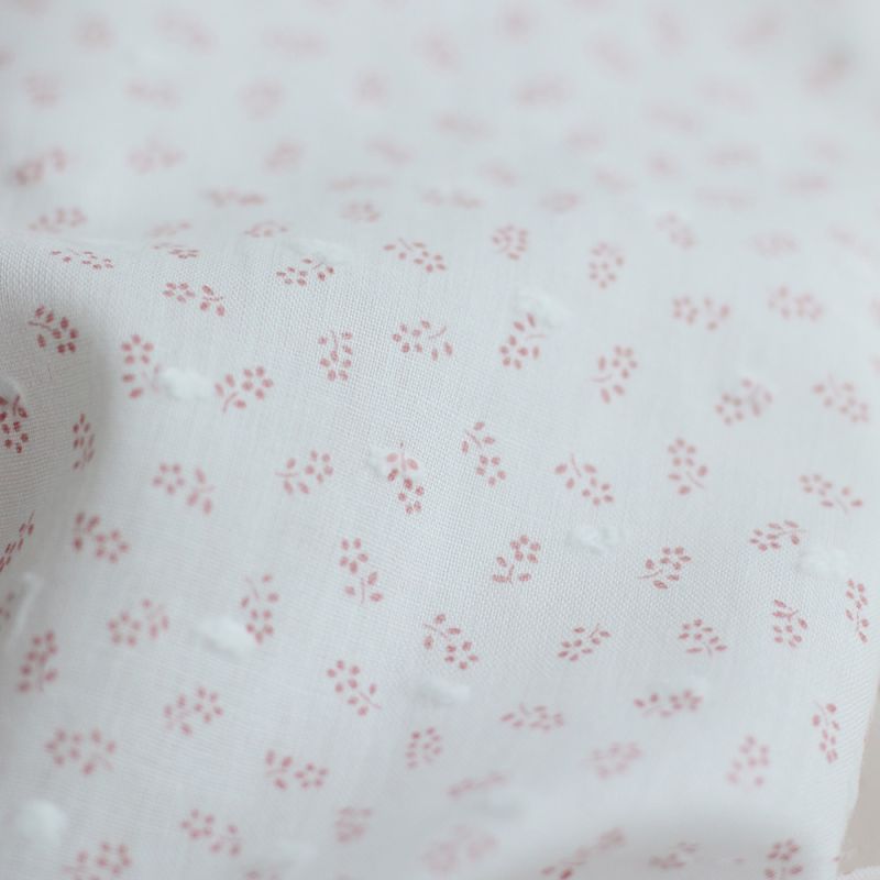 Anaelle - Plumetis de coton blanc imprimé fleuri vieux rose