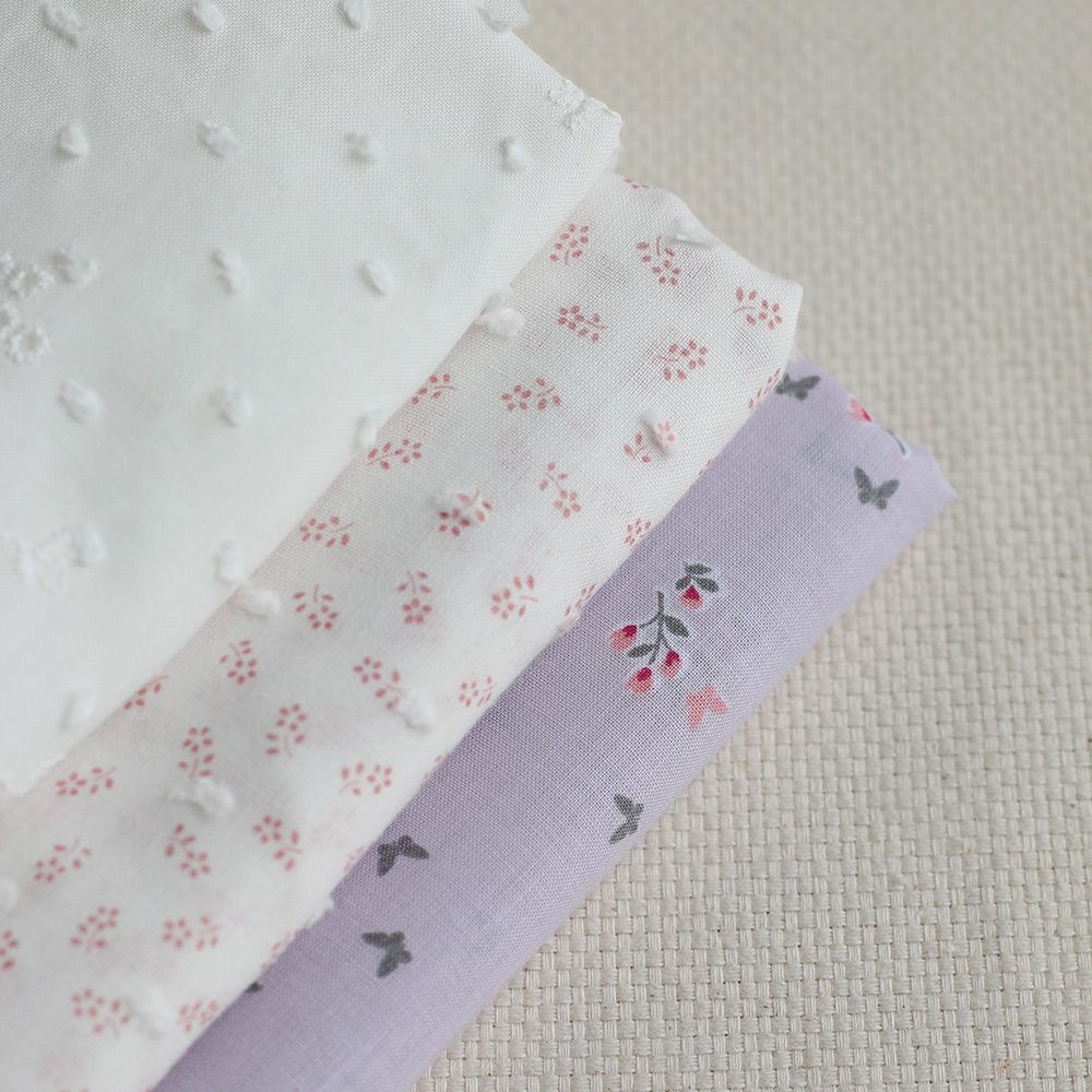 Anaelle - Plumetis de coton blanc imprimé fleuri vieux rose