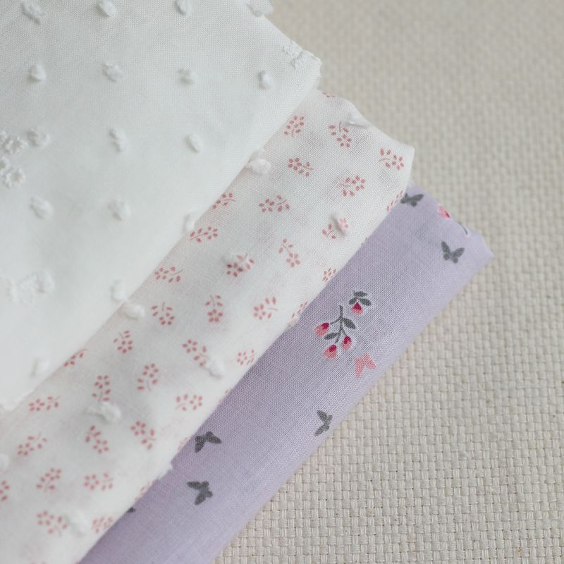 Anaelle - Plumetis de coton blanc imprimé fleuri vieux rose